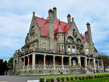 Craigdarroch Castle, a stone mansion with red roofs, in Rockland